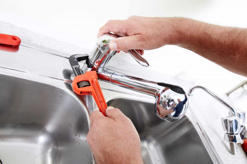 repair of faucet using adjustable wrench