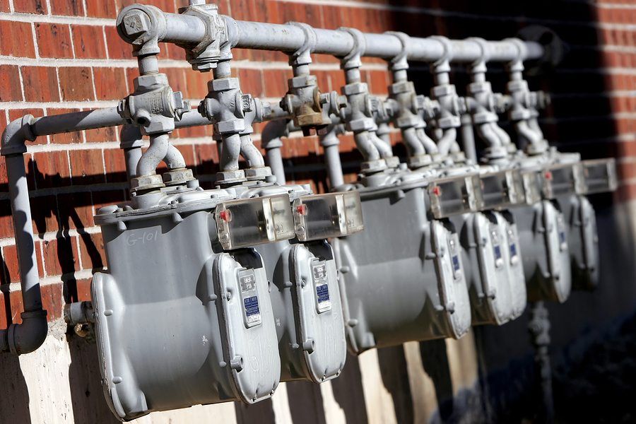 several connected gas meters in a row