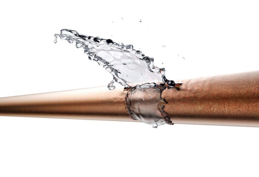 copper pipe with leaking water